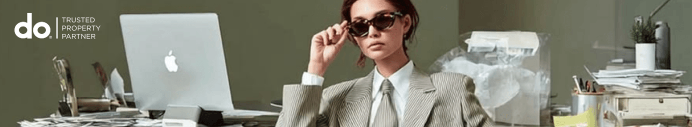 A Do Estate agent at her desk